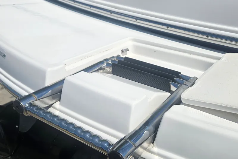 Slide: The Image of 2003 Chaparral 215 SS boat ladder and deck detail in sunlight. - 5