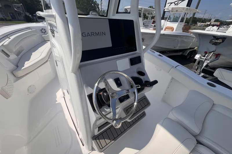 Slide: The Image of Interior view of a 2027 Tidewater 232 LXF boat with Garmin navigation system. - 7