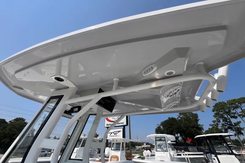 Slide: The Image of 2027 Tidewater 232 LXF boat with sleek T-top and integrated speakers. - 8