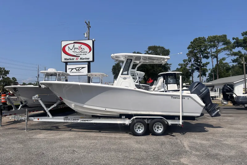 The Image of 2027 Tidewater 232 LXF boat on trailer at Marker 17 Marine dealership. - 0