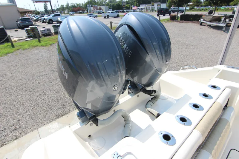 Slide: The Image of 2024 Bulls Bay 255 Center Console with dual Yamaha outboard engines. - 13