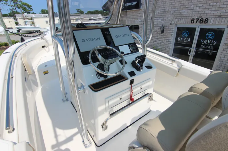 Slide: The Image of 2024 Bulls Bay 255 Center Console boat with Garmin navigation system and dual seating. - 20