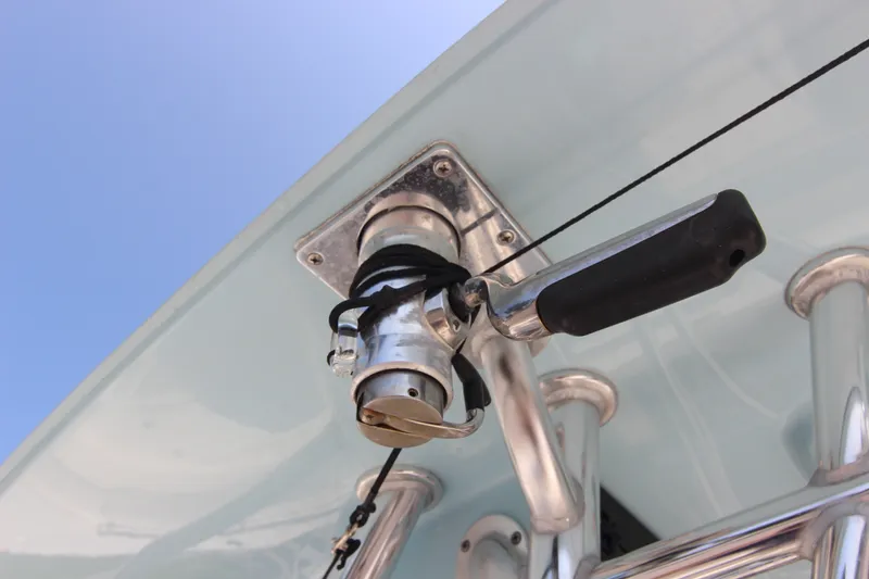 Slide: The Image of Close-up of a 2024 Bulls Bay 255 Center Console boat handle against blue sky. - 24