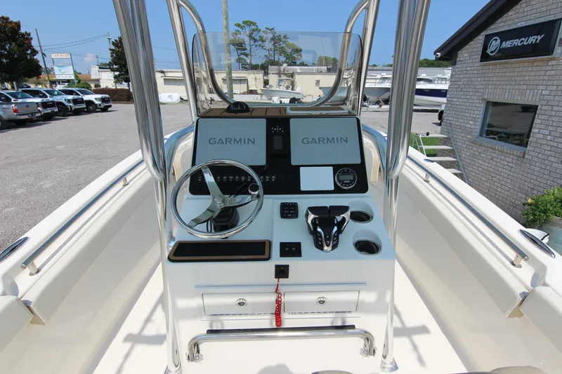 Slide: The Image of 2024 Bulls Bay 255 Center Console boat dashboard with Garmin navigation system. - 21