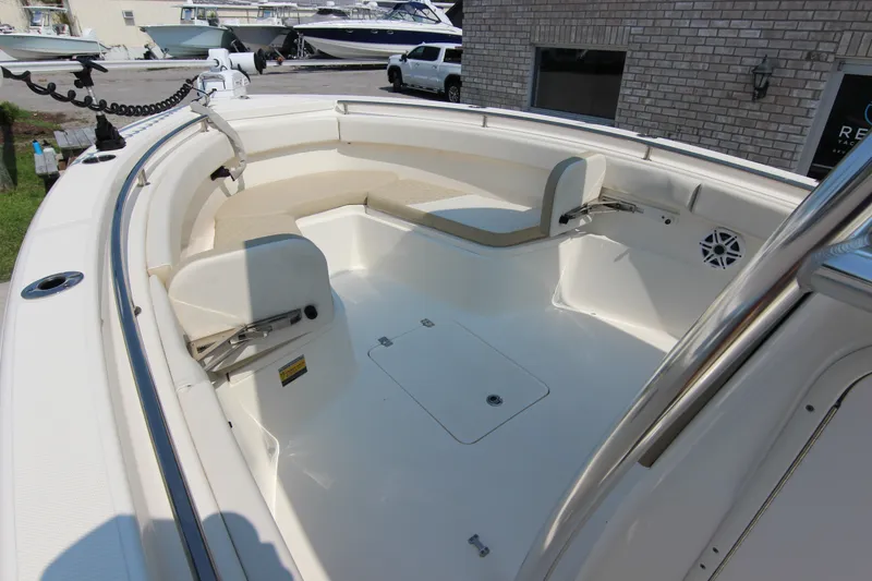 Slide: The Image of 2024 Bulls Bay 255 Center Console boat interior with seating and storage compartments. - 31