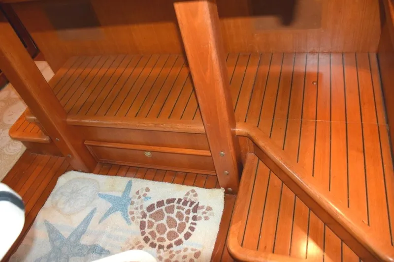 Slide: The Image of Chart drawer beneath pilothouse raised settee - 44