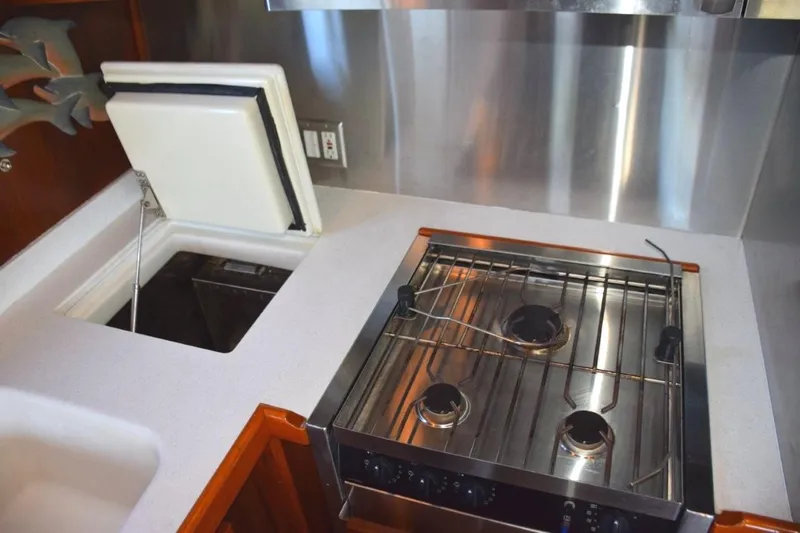 Slide: The Image of Top load counter cold plate freezer, gas range, teak spill railings - 22