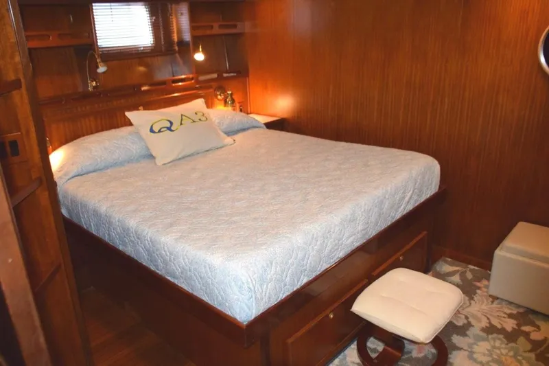 Slide: The Image of Master stateroom with walk-around King berth - 48