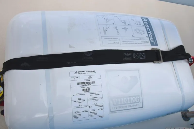 Slide: The Image of Newer 6-man Viking emergency cannister raft - 75