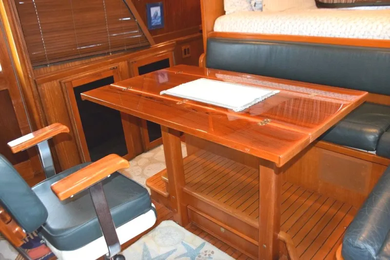 Slide: The Image of Pilothouse table expanded and helm chair turned - 43