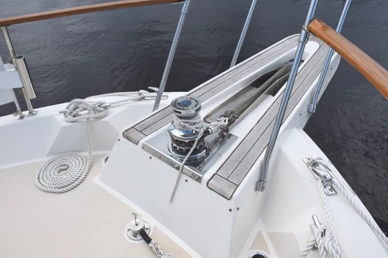 Slide: The Image of Hatteras Pulpit and rebuilt Galley Maid hydraulic windlass. Mounted plow anchor - 67