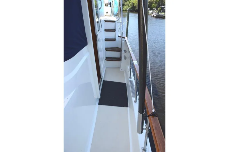 Slide: The Image of portside deck and stairs to flybridge - 69