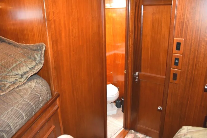 Slide: The Image of Guest stateroom private entry door to Guest head, stateroom door closed. - 60