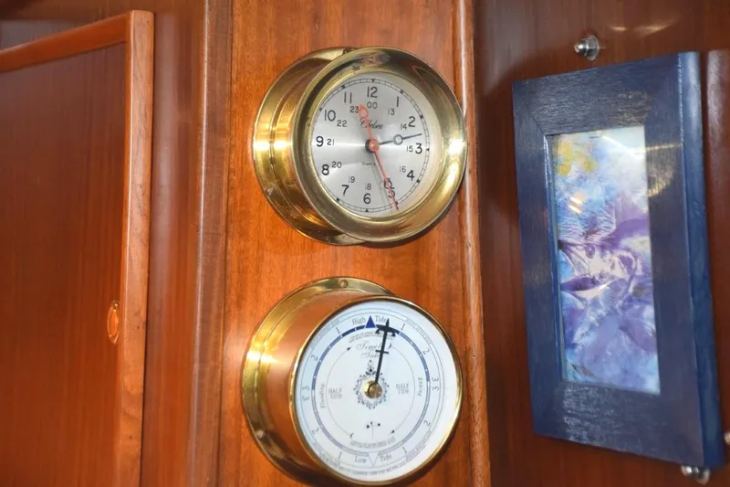 Slide: The Image of Brass clock and barometer - 46