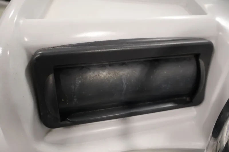 Slide: The Image of Close-up of a 2009 Leisurecraft 22 Cruise boat component, featuring a black handle. - 25