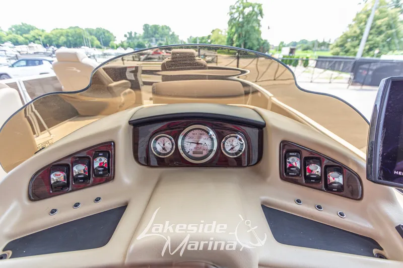 Slide: The Image of Dashboard of a 2017 Bennington 22 GFS boat with gauges and controls. - 28
