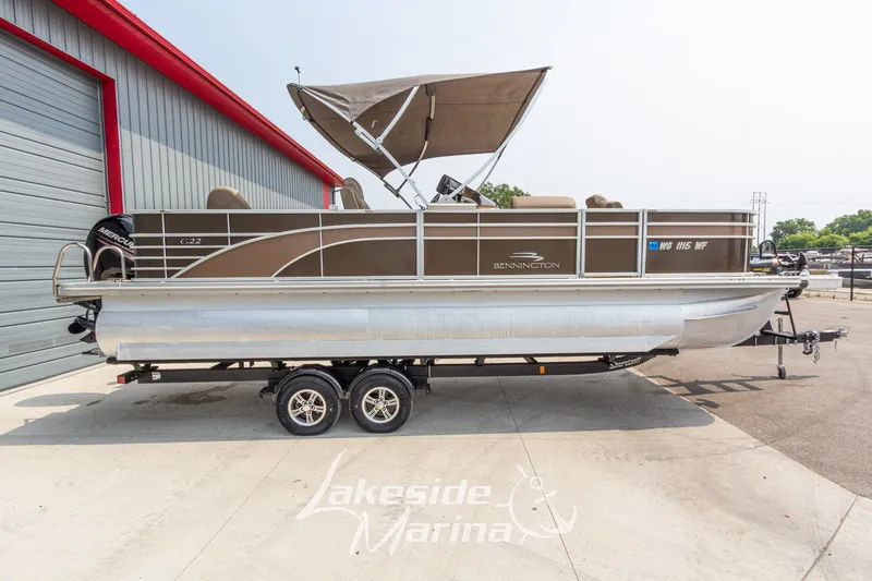Slide: The Image of 2017 Bennington 22 GFS pontoon boat on trailer at Lakeside Marina. - 3