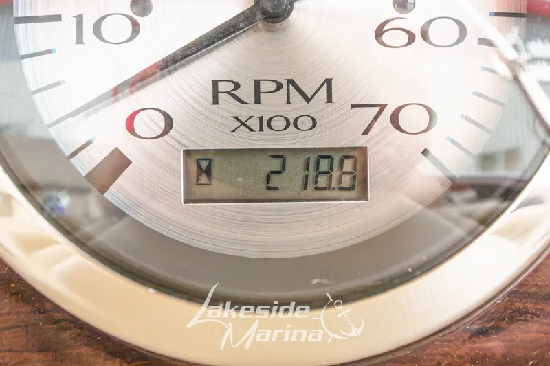 Slide: The Image of Close-up of a Bennington 22 GFS 2017 RPM gauge displaying 218.8 hours. - 31
