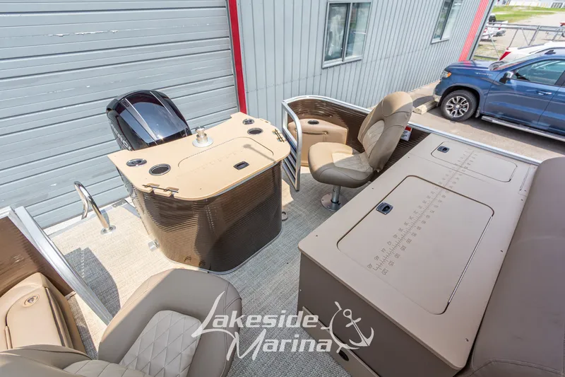 Slide: The Image of 2017 Bennington 22 GFS pontoon boat interior with seating and helm station at Lakeside Marina. - 35