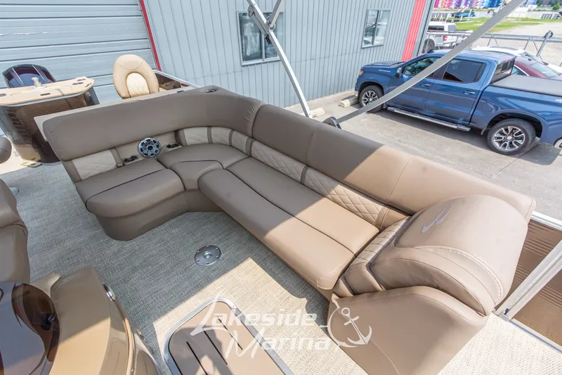 Slide: The Image of 2017 Bennington 22 GFS pontoon boat with luxurious tan seating and modern design. - 22