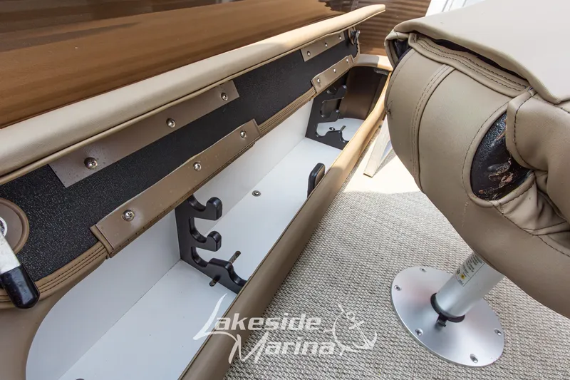 Slide: The Image of 2017 Bennington 22 GFS boat interior with rod holders and seating, Lakeside Marina logo visible. - 34