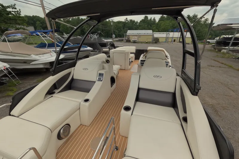 Slide: The Image of 2014 Harris FloteBote Grand Mariner SL 230 pontoon boat with luxurious seating and sleek design. - 8