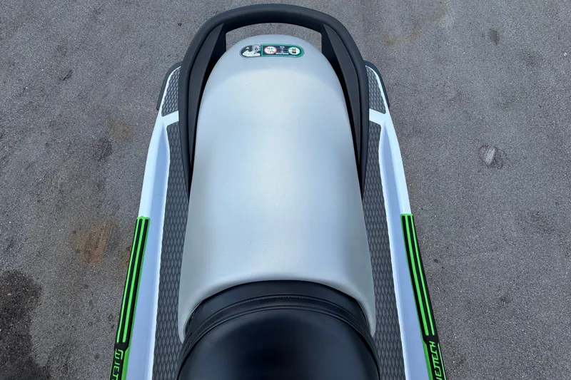 Slide: The Image of 2024 Kawasaki Jetski STX 160X top view, showcasing sleek design and seat details. - 25