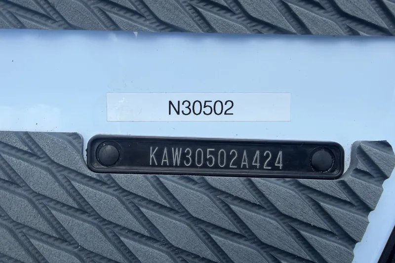 Slide: The Image of Close-up of a serial number on a 2024 Kawasaki Jetski STX 160X. - 29