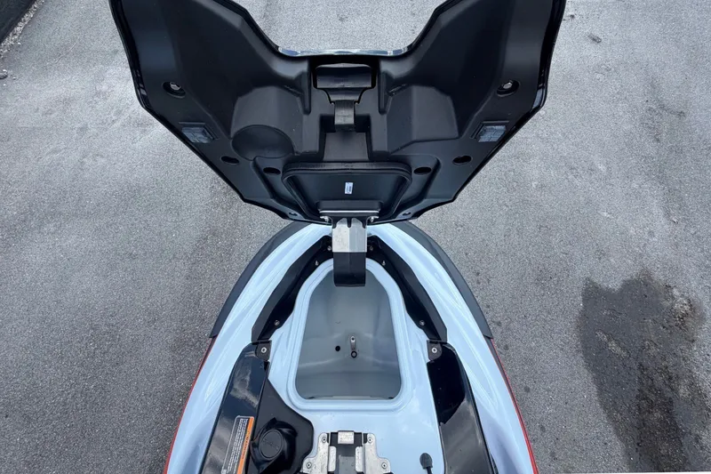 Slide: The Image of A 2024 Kawasaki Jetski STX 160X with the front storage compartment lid open. - 21