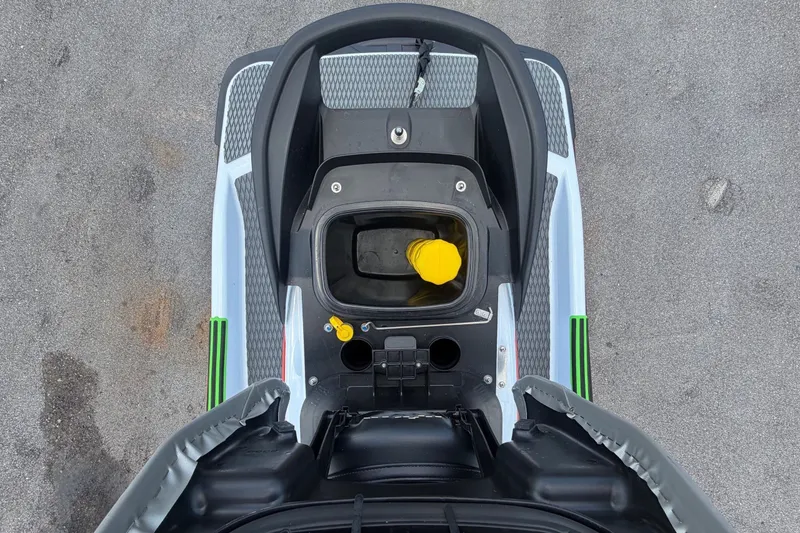 Slide: The Image of Top view of a 2024 Kawasaki Jetski STX 160X with gray and green design. - 26