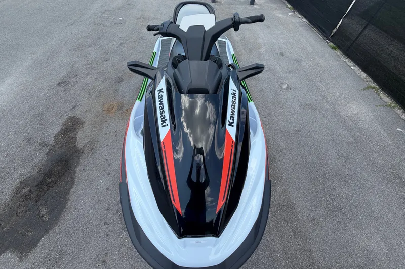 Slide: The Image of 2024 Kawasaki Jetski STX 160X, top view, showcasing sleek design and vibrant decals. - 23