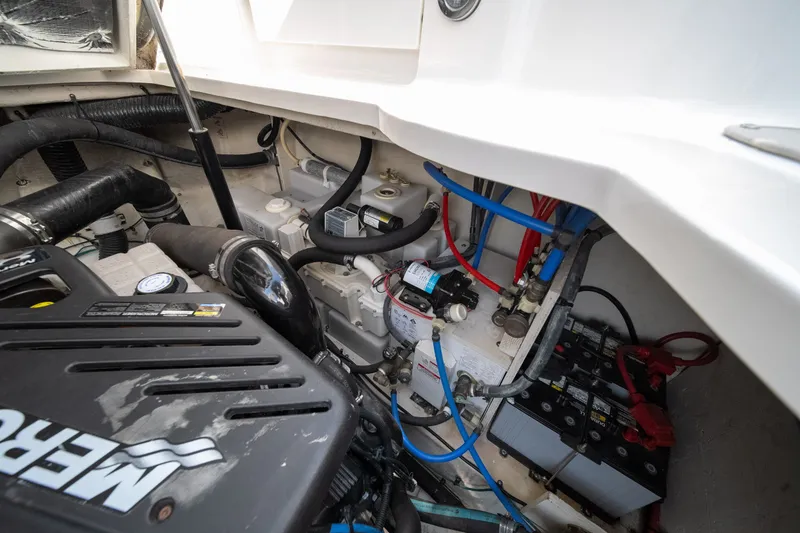 Slide: The Image of Engine compartment of a 2007 Sea Ray 340 Sundancer with visible components and wiring. - 27