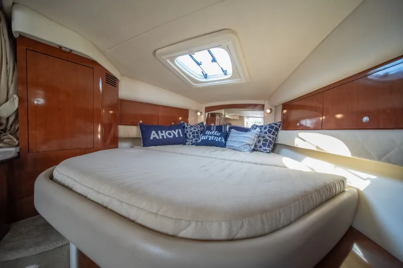 Slide: The Image of Luxurious cabin interior of 2007 Sea Ray 340 Sundancer yacht with cozy bedding. - 61