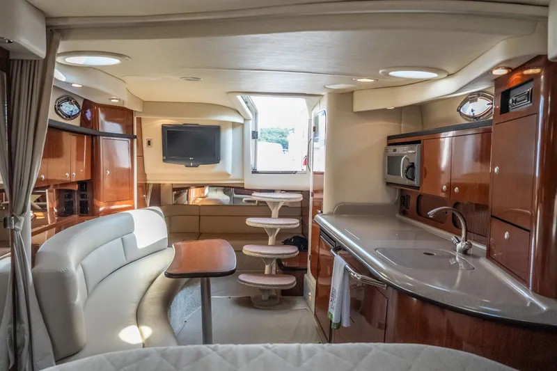 Slide: The Image of Luxurious interior of 2007 Sea Ray 340 Sundancer yacht with modern amenities and elegant design. - 52