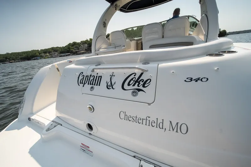 Slide: The Image of 2007 Sea Ray 340 Sundancer boat on water, named "Captain & Coke," Chesterfield, MO. - 14