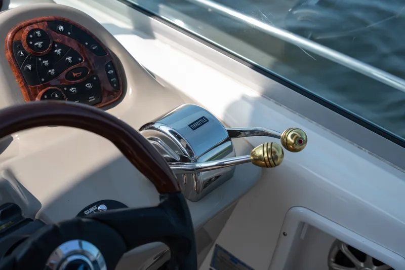 Slide: The Image of Close-up of 2007 Sea Ray 340 Sundancer boat controls and steering wheel. - 47