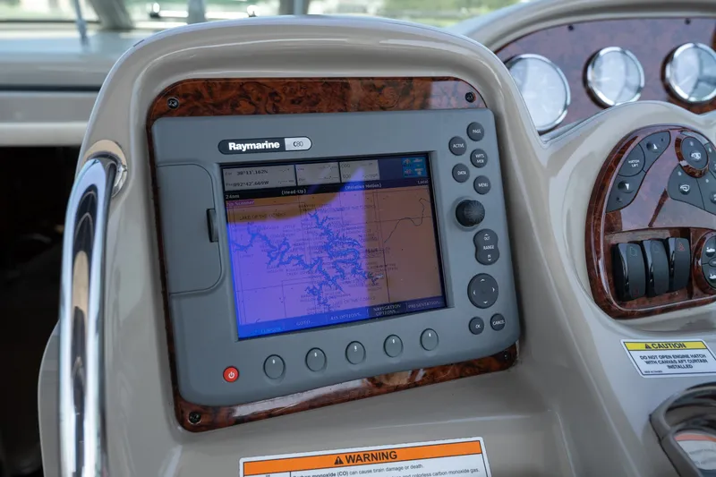 Slide: The Image of Raymarine C80 navigation system on 2007 Sea Ray 340 Sundancer boat dashboard. - 42