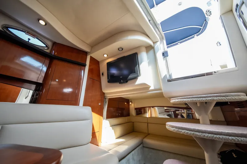 Slide: The Image of Luxurious interior of 2007 Sea Ray 340 Sundancer yacht with plush seating and modern amenities. - 63
