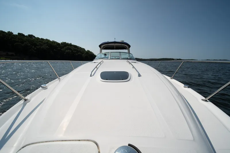 Slide: The Image of 2007 Sea Ray 340 Sundancer cruising on a sunny day, with clear blue skies. - 33