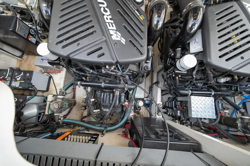 Slide: The Image of Engine compartment of a 2007 Sea Ray 340 Sundancer with dual MerCruiser engines. - 26