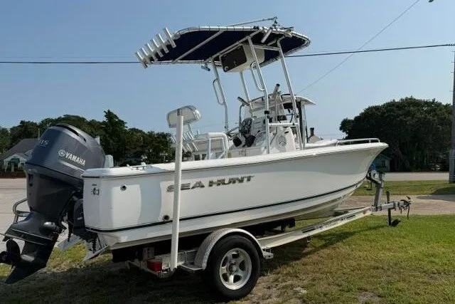 Slide: The Image of 2012 Sea Hunt Triton 177 boat on trailer with Yamaha outboard motor. - 7