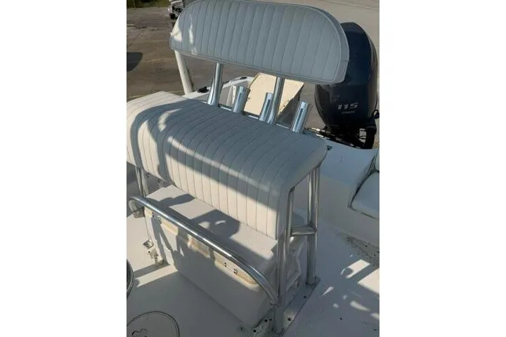 Slide: The Image of 2012 Sea Hunt Triton 177 boat seat with rod holders and Yamaha 115 engine. - 20
