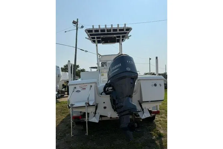 Slide: The Image of 2012 Sea Hunt Triton 177 boat with Yamaha outboard motor, rear view. - 6