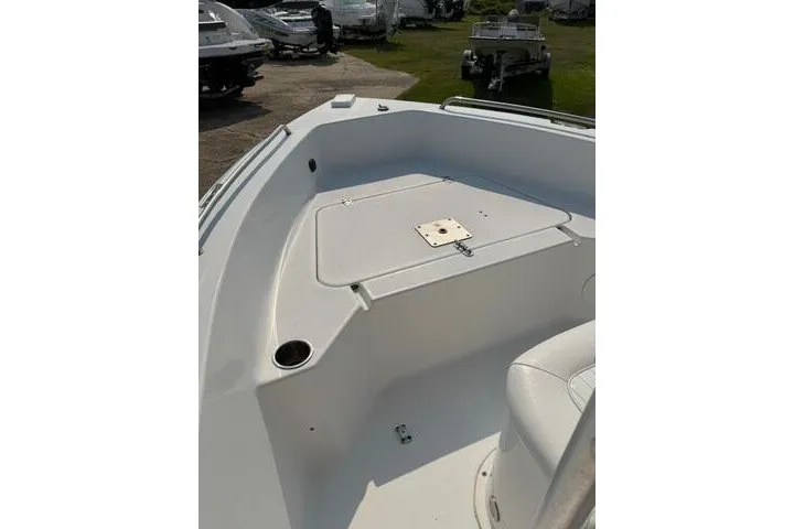 Slide: The Image of 2012 Sea Hunt Triton 177 boat interior, featuring spacious seating and storage area. - 11