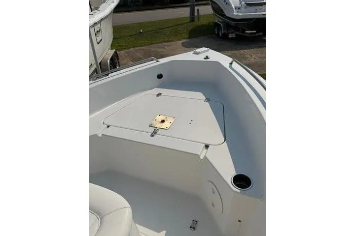 Slide: The Image of 2012 Sea Hunt Triton 177 boat interior, featuring a clean, spacious deck area. - 12
