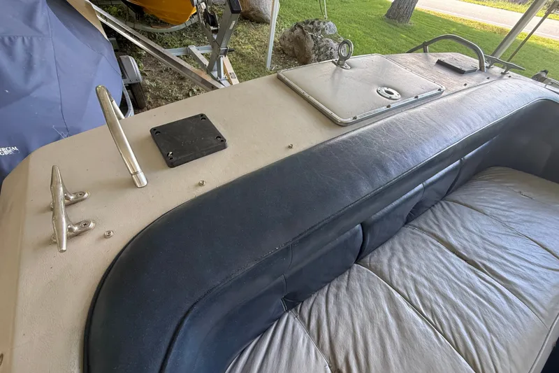 Slide: The Image of 1984 Century Coronado boat interior with leather seating and metal fixtures. - 13