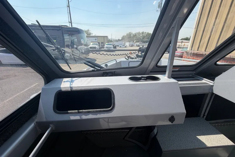 Slide: The Image of Interior view of a 2016 Weldcraft 220 Maverick DV boat dashboard. - 17