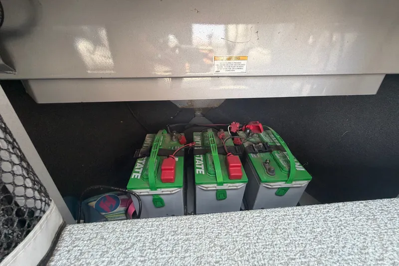 Slide: The Image of Batteries in a 2016 Weldcraft 220 Maverick DV boat compartment. - 18