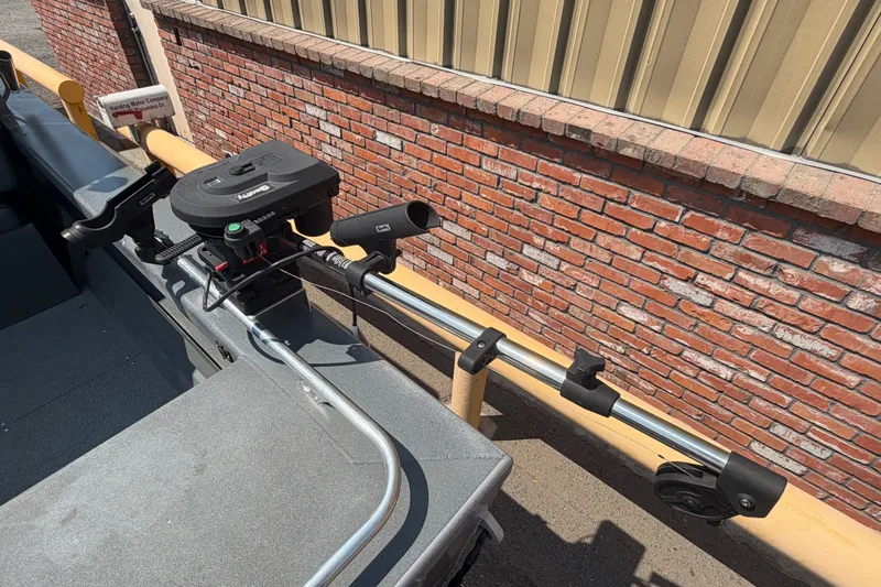 Slide: The Image of 2016 Weldcraft 220 Maverick DV boat with mounted fishing rod holders and equipment. - 14