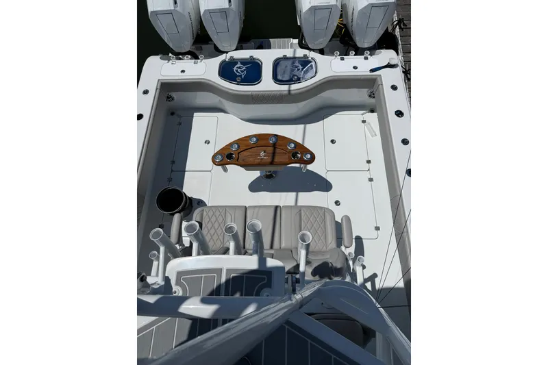 Slide: The Image of Aerial view of 2026 Freeman 42LR boat deck with seating and rod holders. - 21